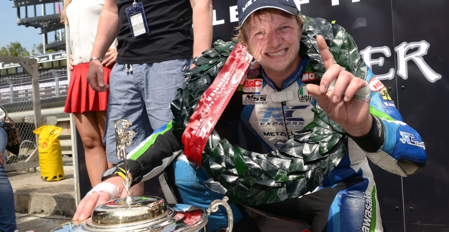 #6 Ivan Lintin celebrating his Lightweight TT win 2015