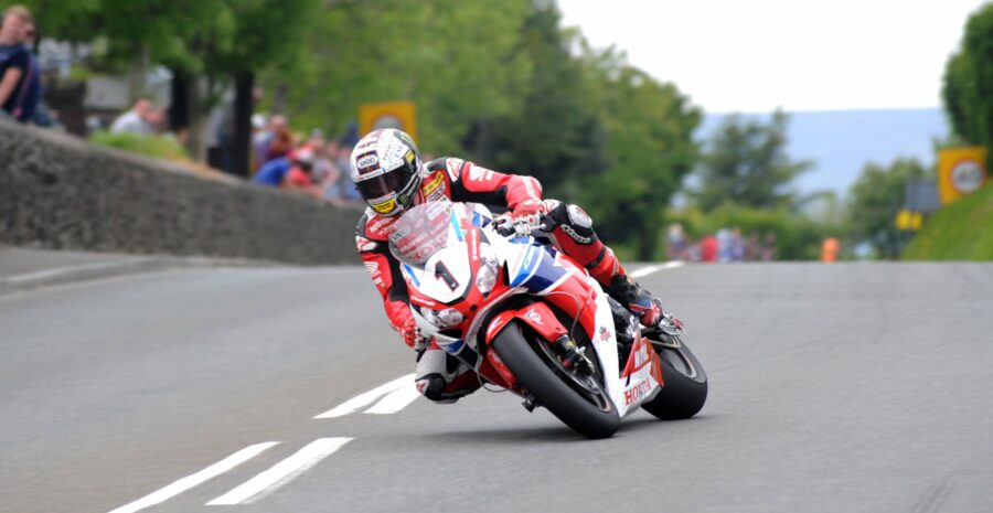 John McGuinness on the Honda Racing Fireblade at Signpost during the the Pokerstars Senior TT race at the 2015 Monster Energy Isle of Man TT