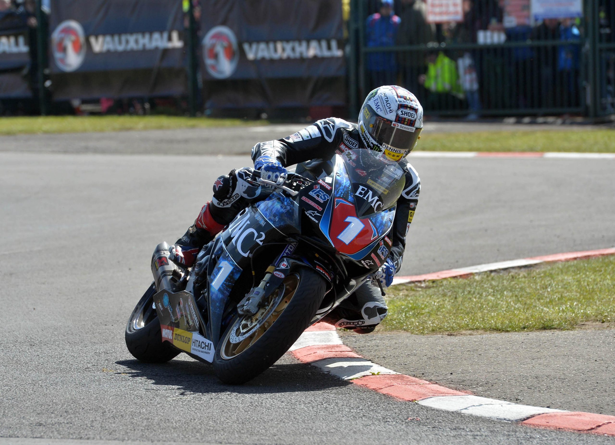 John in action at the NW200 on the EMC2 Superstock Honda by Pacemaker Press International