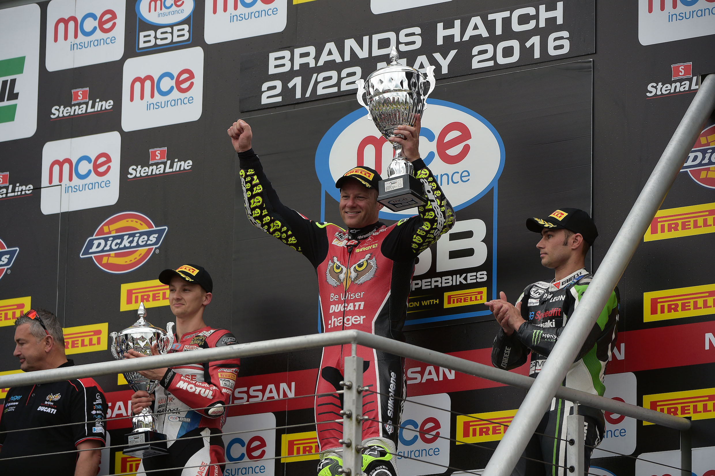 Shakey shakes off his Ducati worries as he reaches the podium at Brands.