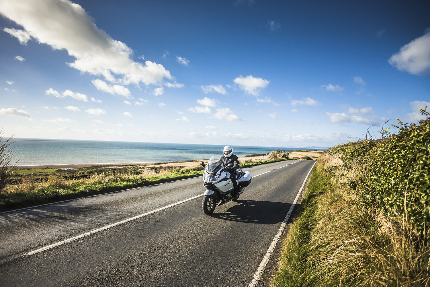 Motorcycle riding along the coast of Dorset